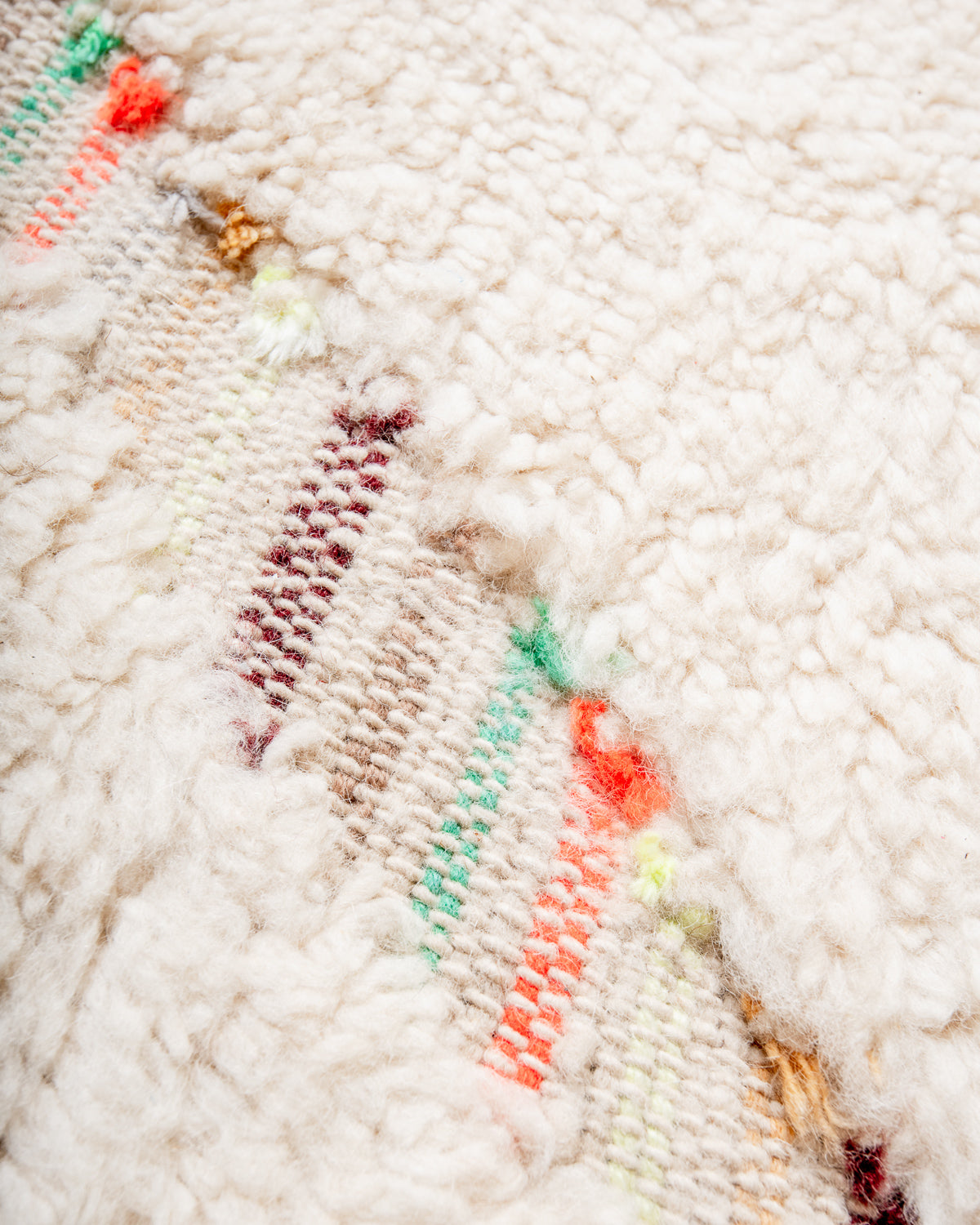 Modern, designer, handcrafted Berber rug from Morocco. Beniourain carpet with beautiful colours and patterns and fluffy wool texture.